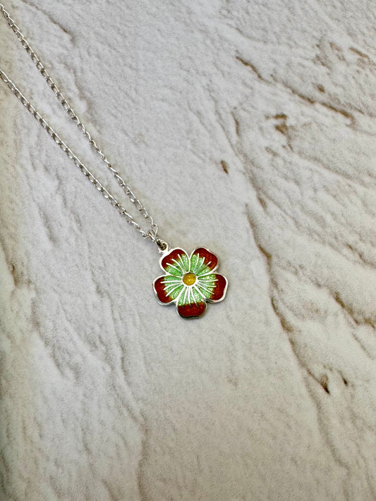 Flor verde rojo